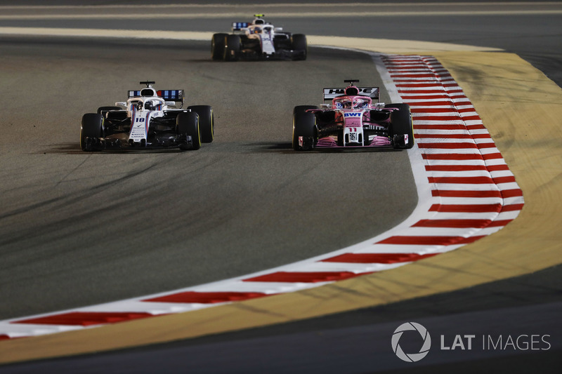 Lance Stroll, Williams FW41 Mercedes, leads Sergio Perez, Force India VJM11 Mercedes, and Sergey Sir