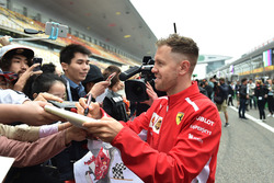 Sebastian Vettel, Ferrari signs autographs for the fans
