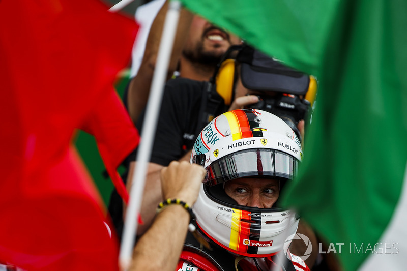 Sebastian Vettel, Ferrari, 1st position, celebrates in Parc Ferme with his team