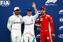 Pole sitter Valtteri Bottas, Mercedes AMG F1, second place Lewis Hamilton, Mercedes AMG F1, third place Sebastian Vettel, Ferrari