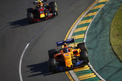 Fernando Alonso, McLaren MCL33 Renault, leads Max Verstappen, Red Bull Racing RB14 Tag Heuer