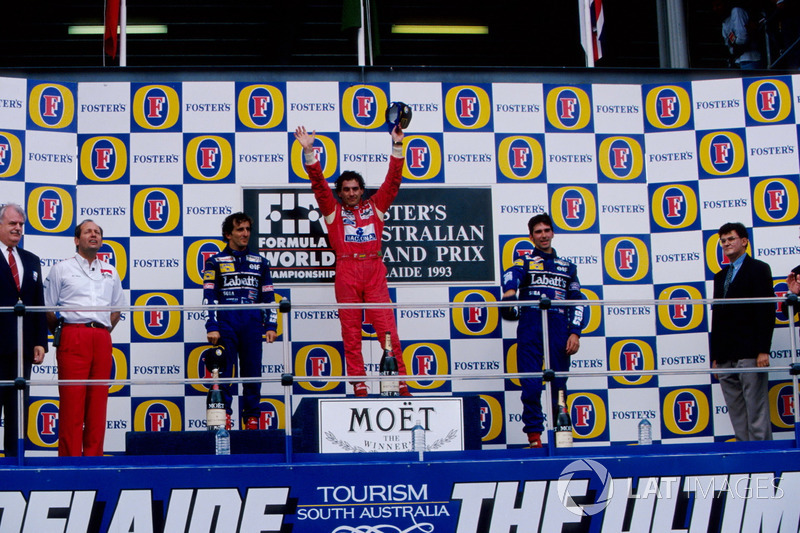 Podium: second place Alain Prost, Williams, Race winner Ayrton Senna, McLaren, third place Damon Hill, Williams