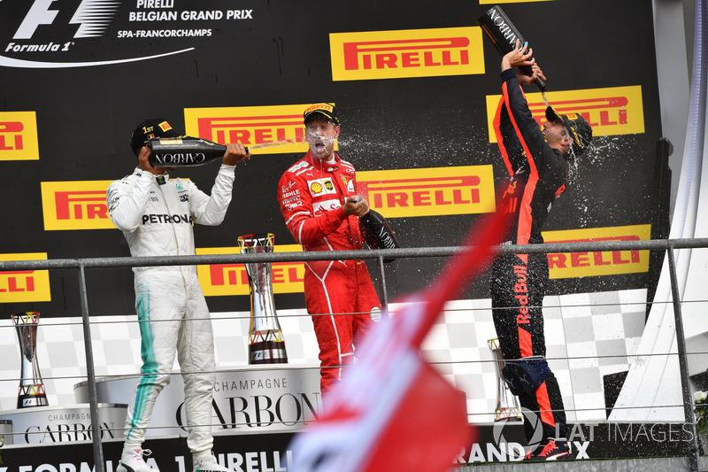 Lewis Hamilton, Mercedes AMG F1, Sebastian Vettel, Ferrari and Daniel Ricciardo, Red Bull Racing celebrate on the podium, the champagne