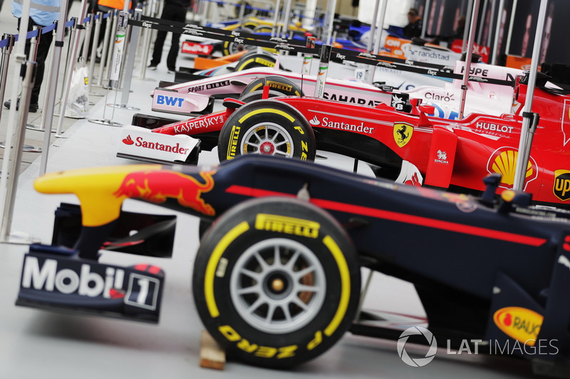 A line-up of Formula 1 cars ahead of the London street demonstration, including a Red Bull Racing, F