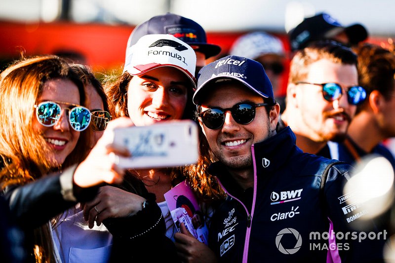 Sergio Perez, Racing Point poses for a seflie with a fan