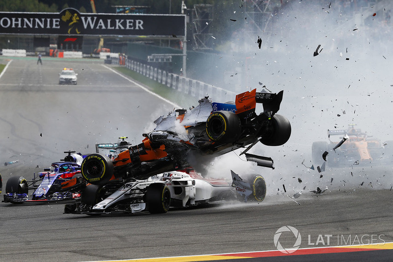 Fernando Alonso, McLaren MCL33, crashes over Charles Leclerc, Sauber C37, after contact from Nico Hulkenberg, Renault Sport F1 Team R.S. 18, at the start