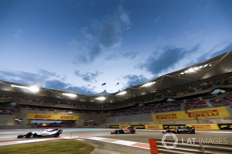 Felipe Massa, Williams FW40 leads Fernando Alonso, McLaren MCL32 and Carlos Sainz Jr., Renault Sport