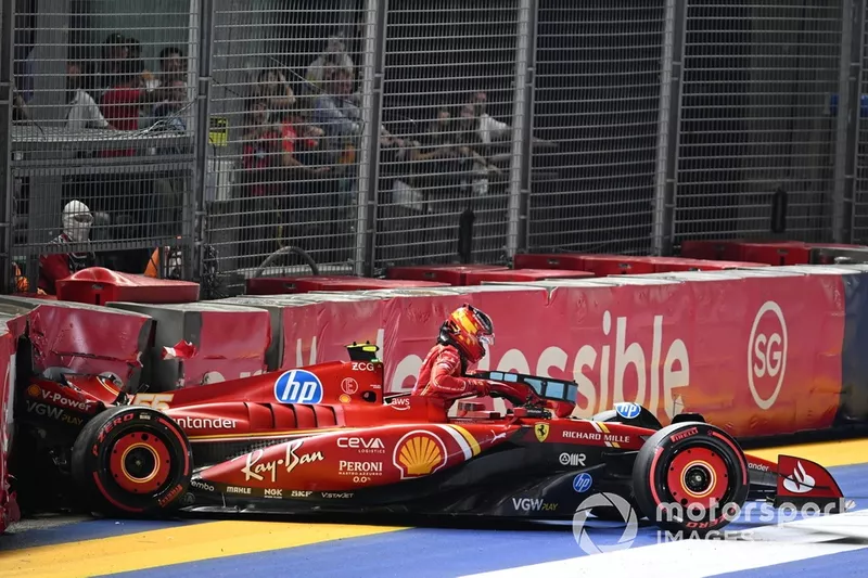 Carlos Sainz, Ferrari SF-24, climbs out of his damaged car after a crash in Qualifying