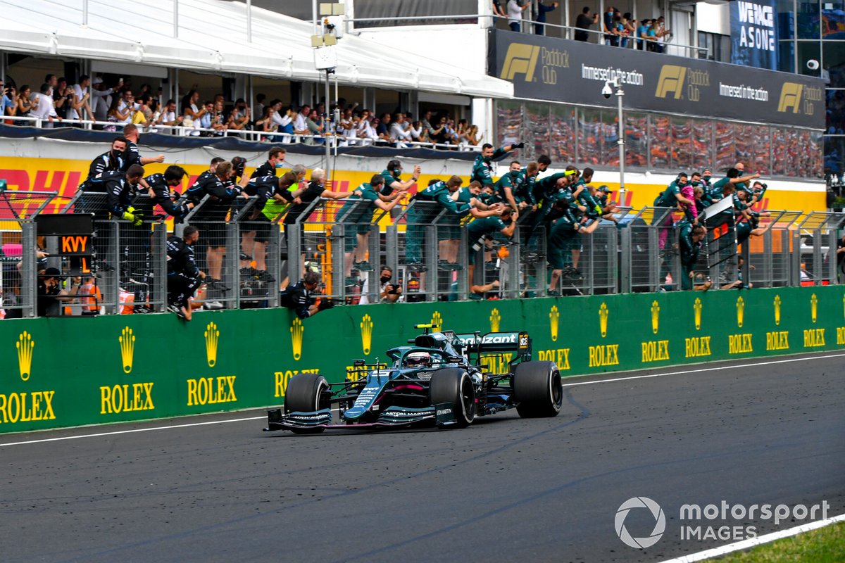 Sebastian Vettel, Aston Martin AMR21, 2nd position, is cheered over the line