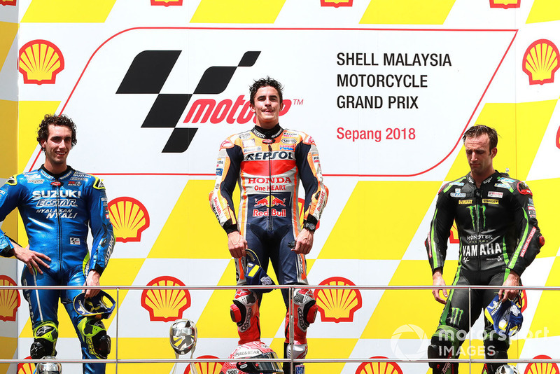 Подіум: друге місце Алекс Рінс, Team Suzuki MotoGP, переможець гонки Марк Маркес, Repsol Honda Team, третє місце Жоанн Зарко, Monster Yamaha Tech 3
