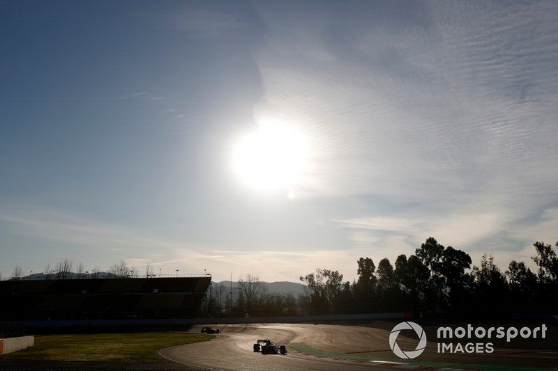 Lewis Hamilton, Mercedes F1 W11 y Sebastian Vettel, Ferrari SF1000 