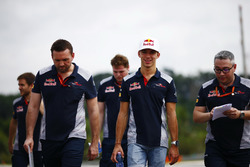 Pierre Gasly, Scuderia Toro Rosso, conducts a track walk, colleagues
