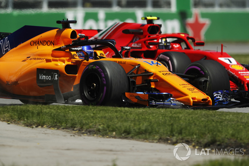 Fernando Alonso, McLaren MCL33, et Kimi Raikkonen, Ferrari SF71H