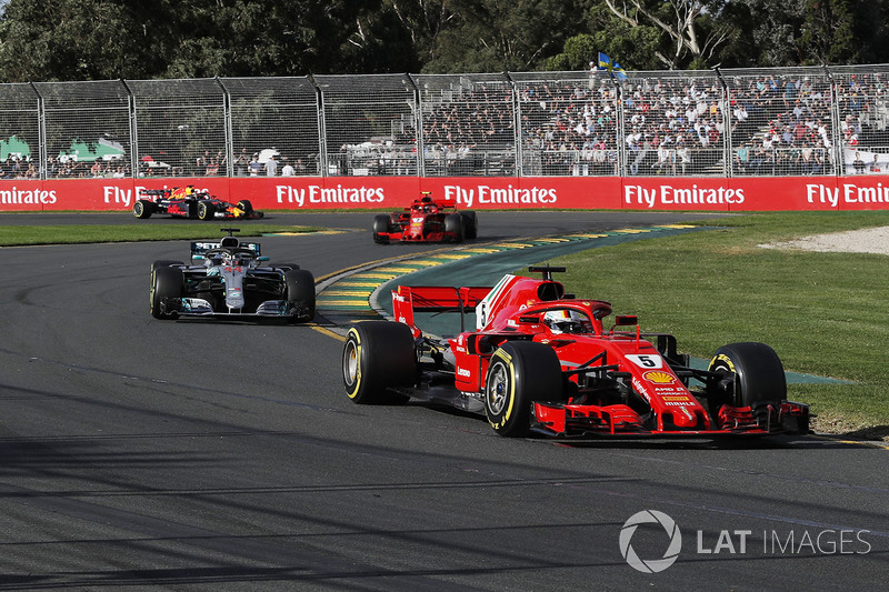 Sebastian Vettel, Ferrari SF71H leads Lewis Hamilton, Mercedes-AMG F1 W09