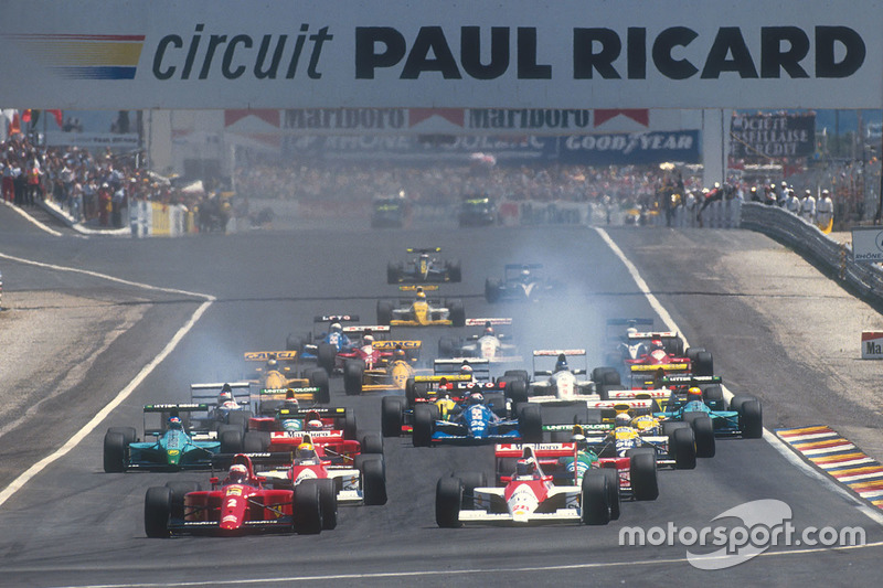 Nigel Mansell, Ferrari 641 leads Gerhard Berger, McLaren MP4/5B Honda, Ayrton Senna, McLaren MP4/5B Honda, Alessandro Nannini, Benetton B190 Ford, Alain Prost, Ferrari 641, Riccardo Patrese, Williams FW13B Renault and Ivan Capelli, Leyton House CG901 Judd