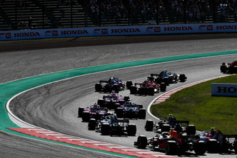 Kimi Raikkonen, Ferrari SF71H, Romain Grosjean, Haas F1 Team VF-18, Sebastian Vettel, Ferrari SF71H, Brendon Hartley, Toro Rosso STR13, and Sergio Perez, Racing Point Force India VJM11, Kevin Magnussen, Haas F1 Team VF-18, et Carlos Sainz Jr., Renault Sport F1 Team R.S. 18