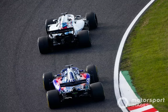 Lance Stroll, Williams FW41, y Brendon Hartley, Toro Rosso STR13