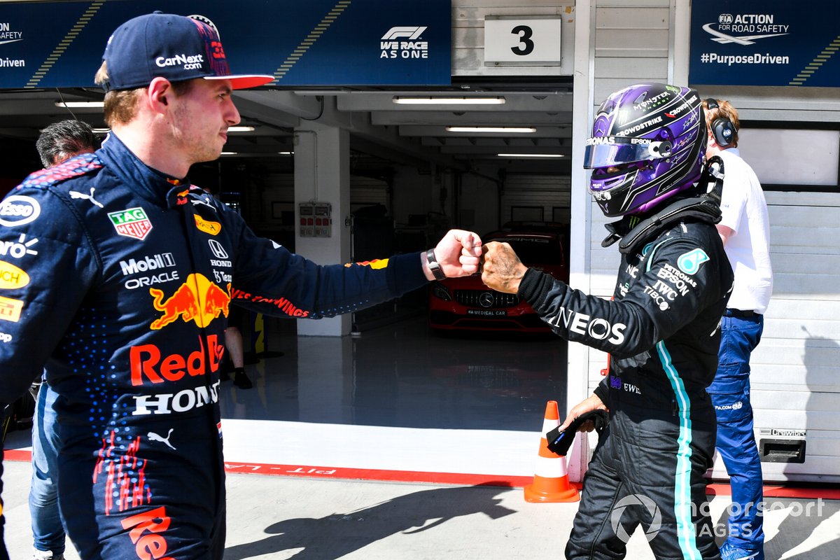 Pole man Lewis Hamilton, Mercedes, fist bumbs Max Verstappen, Red Bull Racing, in Parc Ferme after Qualifying