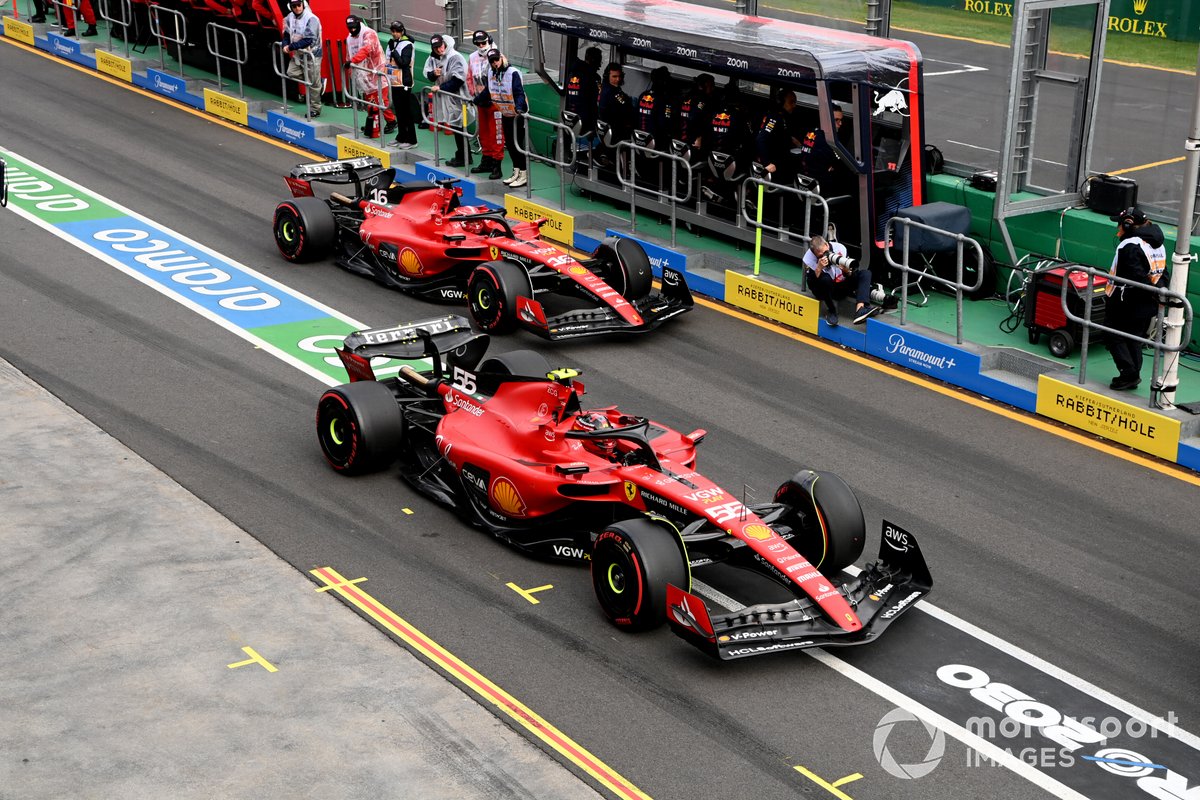 Carlos Sainz, Ferrari SF-23, Charles Leclerc, Ferrari SF-23, leave the garage