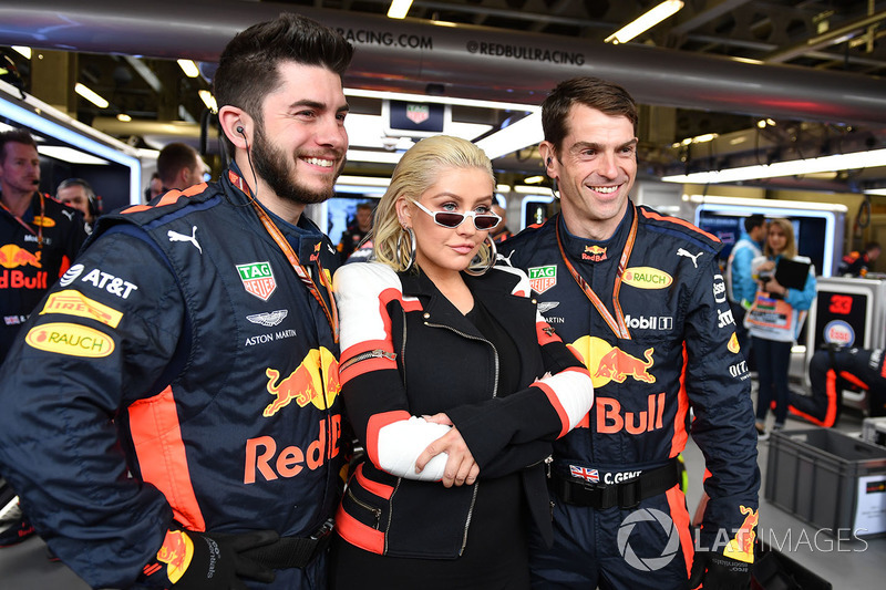 Christina Aguilera, with Red Bull Racing mechanics