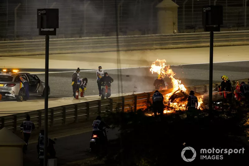 The crashed car of Romain Grosjean, Haas VF-20 on fire