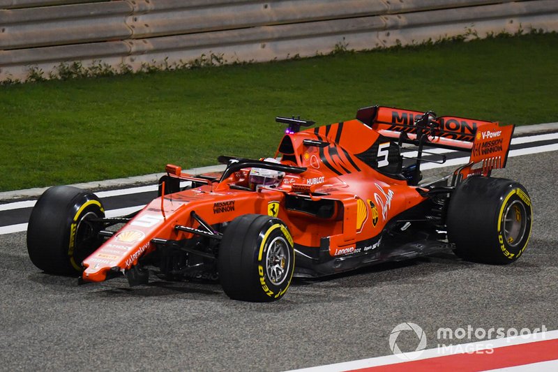 Sebastian Vettel, Ferrari SF90, heads to the pits with a broken front wing