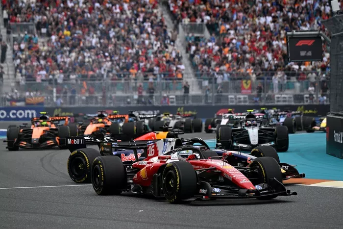Charles Leclerc, Ferrari; Max Verstappen, Red Bull Racing
