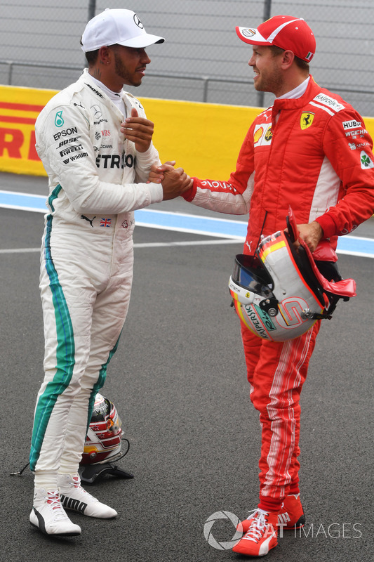 Lewis Hamilton, Mercedes-AMG F1 and Sebastian Vettel, Ferrari celebrate in parc ferme