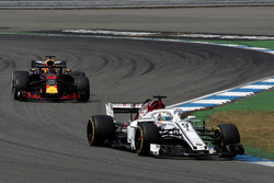 Marcus Ericsson, Sauber C37 and Daniel Ricciardo, Red Bull Racing RB14