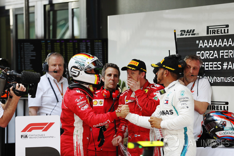 Победитель Себастьян Феттель, Ferrari, второе место – Льюис Хэмилтон, Mercedes AMG F1, третье место – Кими Райкконен, Ferrari