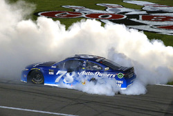 Martin Truex Jr., Furniture Row Racing Toyota celebrates his win with a burnout