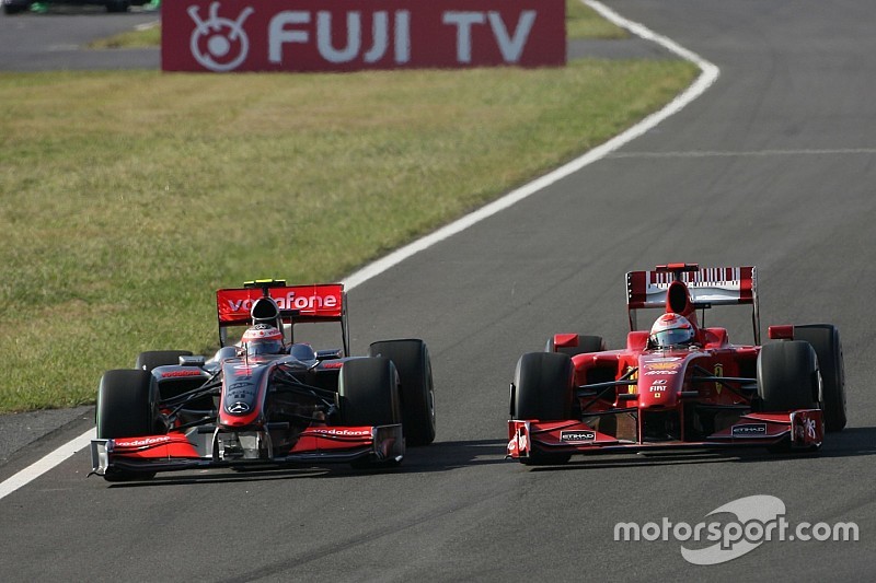 Heikki Kovalainen, McLaren Mercedes und Giancarlo Fisichella, Scuderia Ferrari