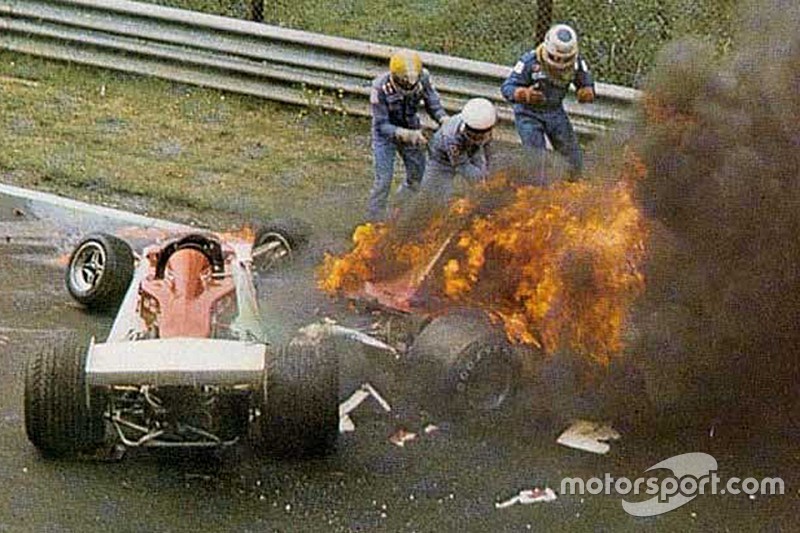 Niki Lauda, Ferrari 312T2 on fire after crashing near Bergwerk corner