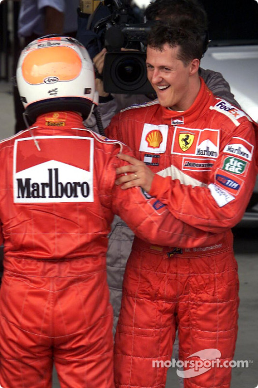 Rubens Barrichello and Michael Schumacher after the race