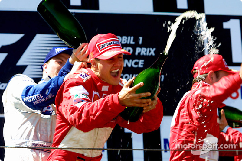 Ralf Schumacher, Michael Schumacher and Rubens Barrichello on the podium