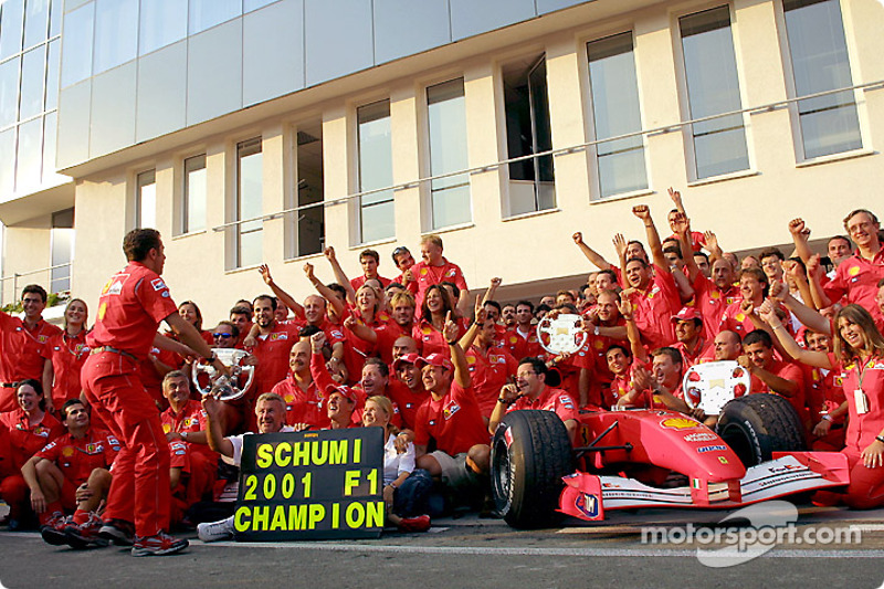 Michael Schumacher celebrating with Team Ferrari