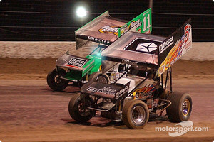 The racing Kinsers battled it out in the qualifying dash for the Silver State Shootout; #5 Mark Kinser won the qualifying dash and led every lap of the World of Outlaws feature while  #11 Steve Kinser finished second in the dash and third in the feature