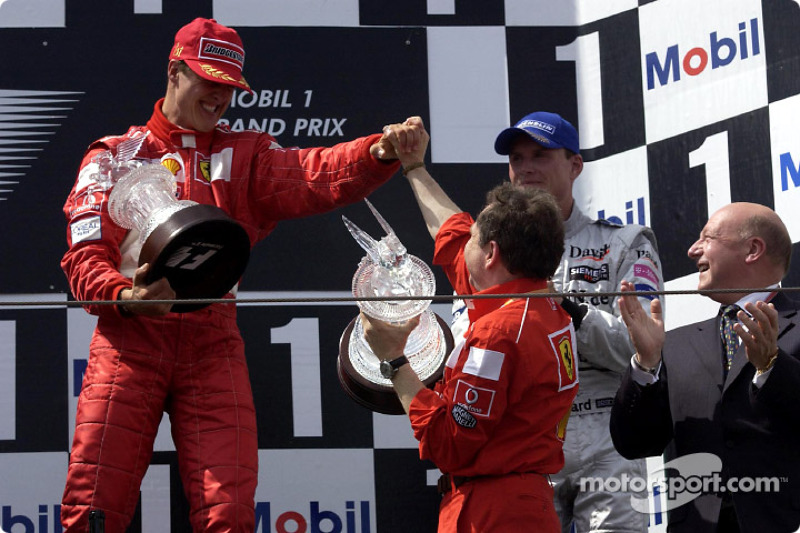 The podium: Michael Schumacher, Jean Todt and David Coulthard