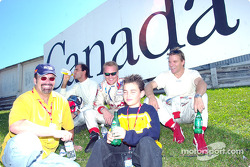 Emanuele Pirro, Johnny Herbert and Stefan Johansson relaxing