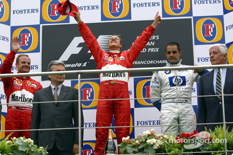 The podium: race winner Michael Schumacher with Rubens Barrichello and Juan Pablo Montoya