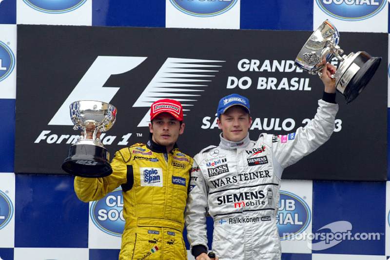 The podium: Giancarlo Fisichella and race winner Kimi Raikkonen