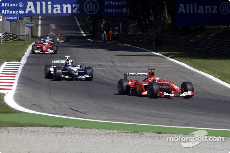 Michael Schumacher leads Juan Pablo Montoya