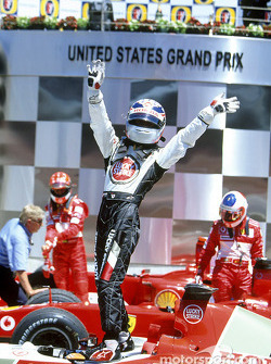 Takuma Sato celebrates third place finish