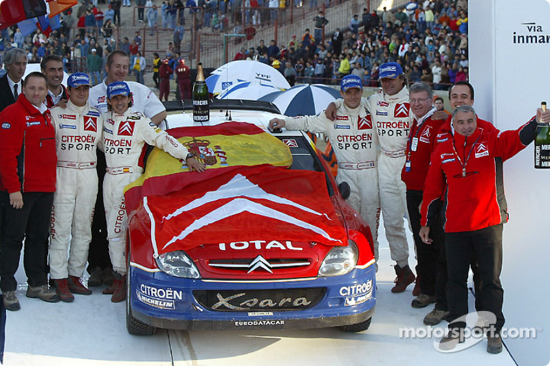 Podium: winners Carlos Sainz and Marc Marti celebrate with Sébastien Loeb, Daniel Elena and Corrado 