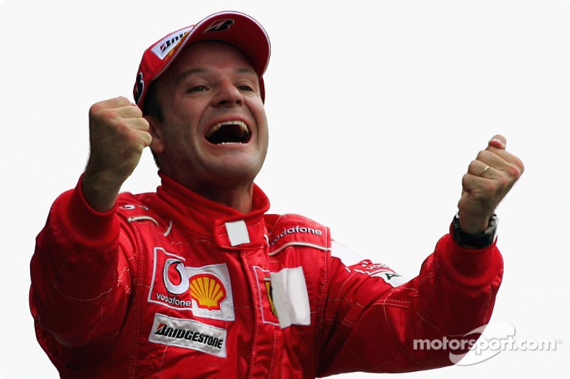 Race winner Rubens Barrichello celebrates