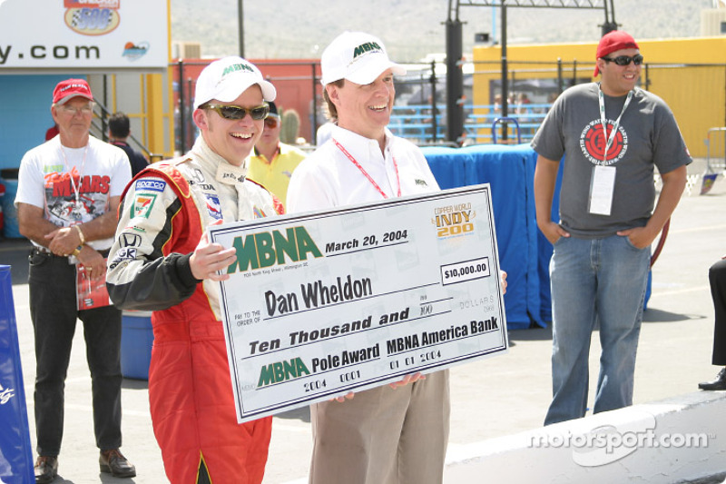 Dan Wheldon receives MBNA Pole Award check