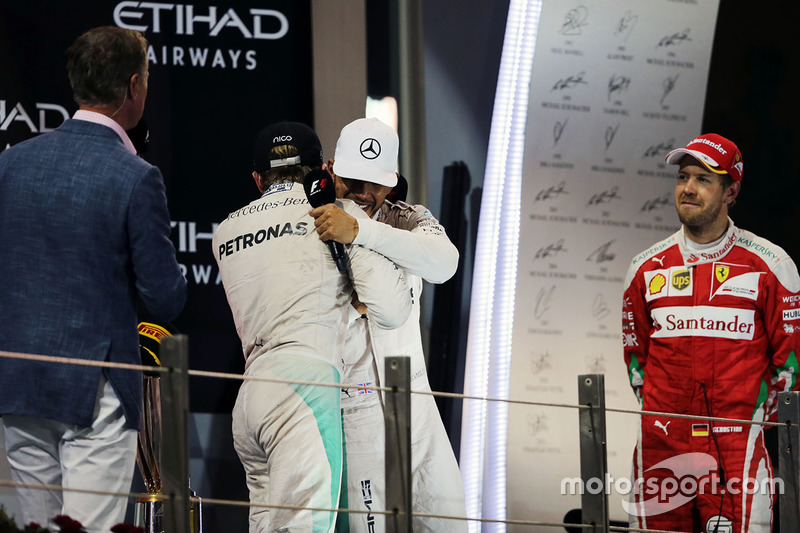 World Champion Nico Rosberg, Mercedes AMG F1 shakes hands with team mate and race winner Lewis Hamilton, Mercedes AMG F1