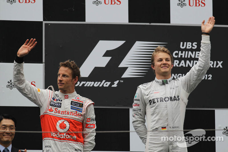 Segundo Lugar Jenson Button, McLaren Mercedes conel primer lugar Nico Rosberg, Mercedes AMG Petronas