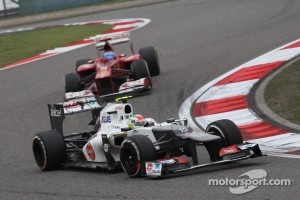Sergio Perez, Sauber F1 Team leads Fernando Alonso, Scuderia Ferrari