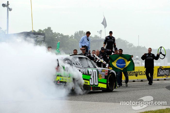 Race winner Nelson Piquet Jr. celebrates